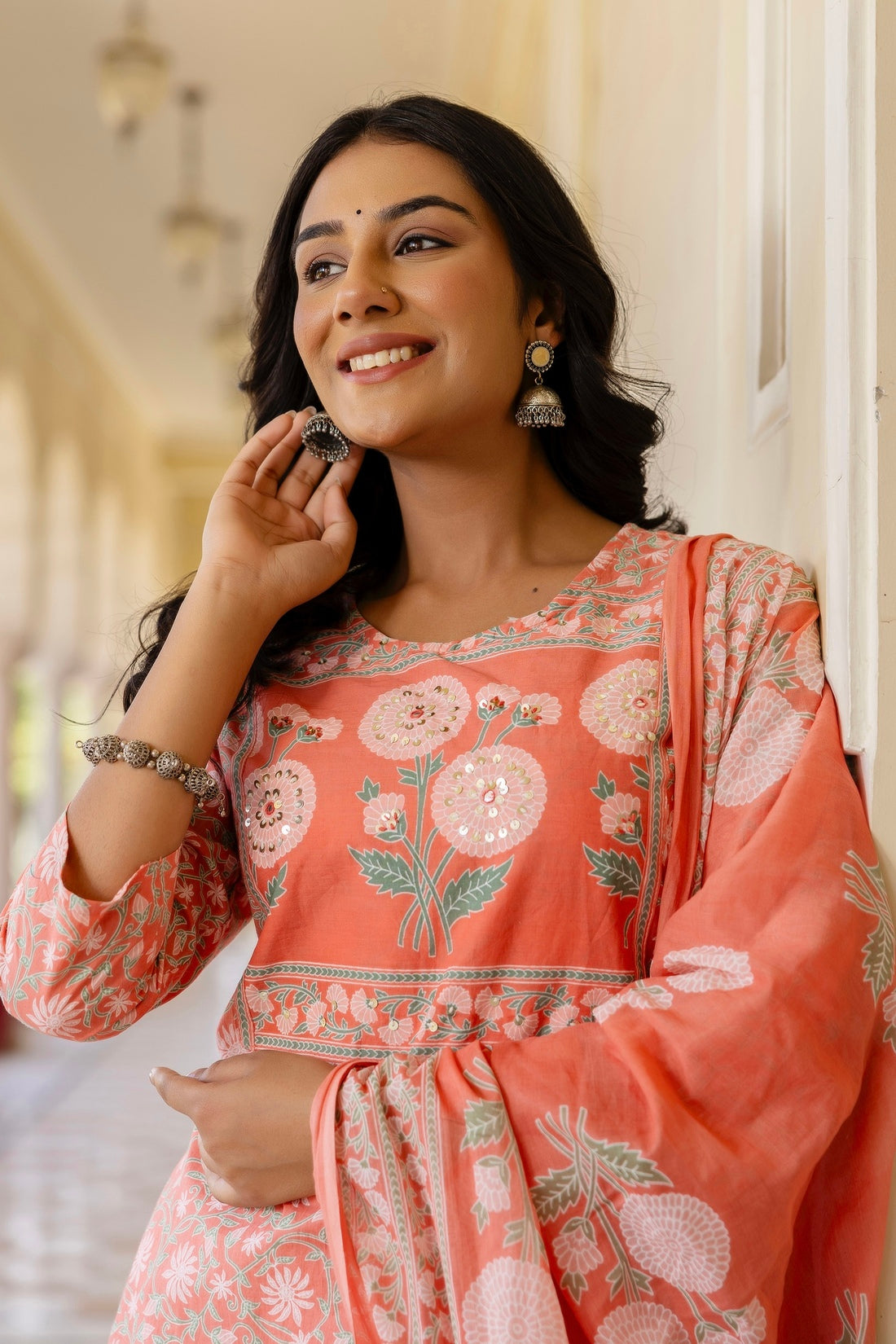 Peach Yoke Highlighted Floral Cotton Kurta Set with Trousers and Dupatta Peach Yoke Highlighted Floral Cotton Kurta Set with Trousers and Dupatta