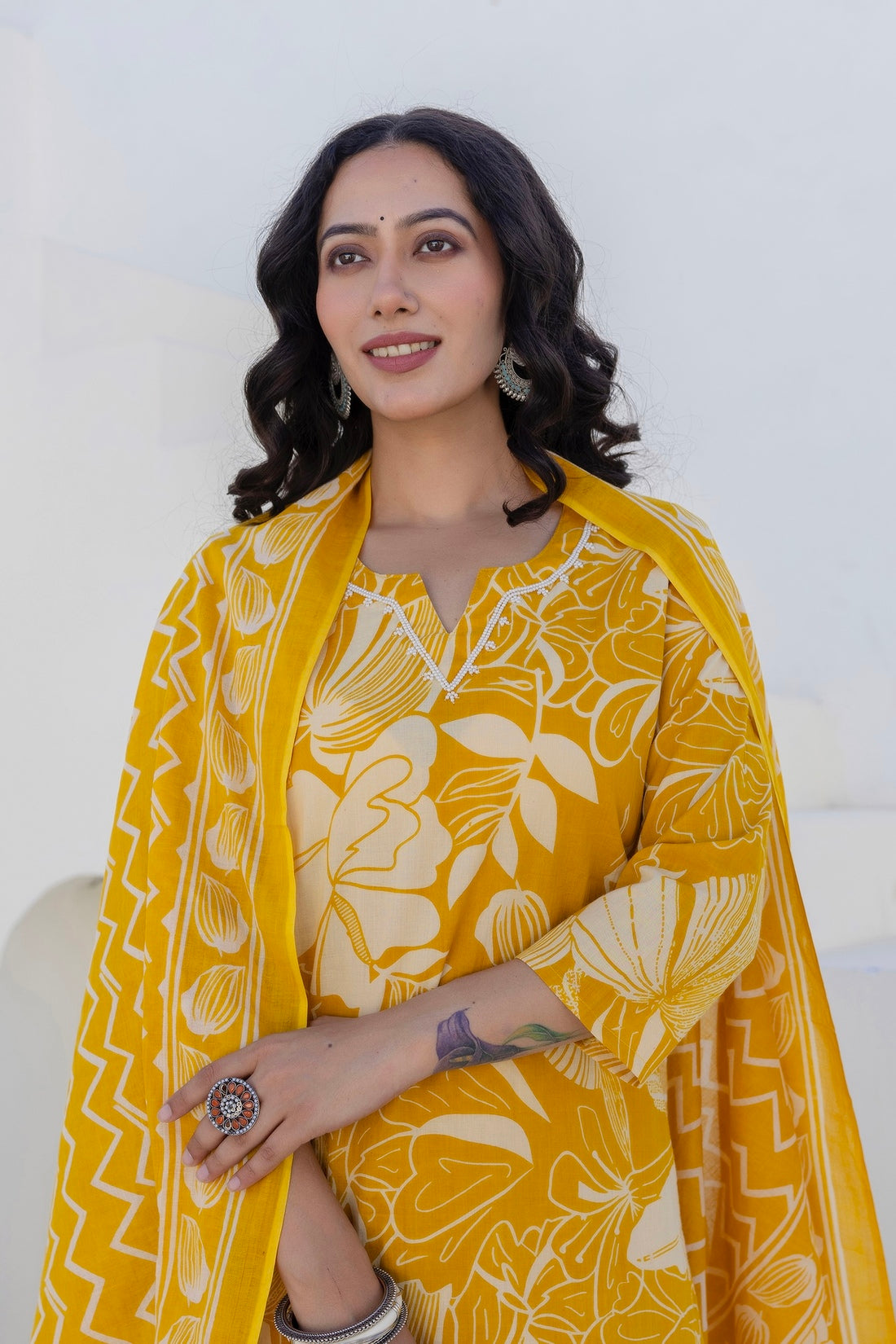 Mustard Yellow Pearl Highlight Cotton Kurta Set with Trousers and Dupatta Mustard Yellow Pearl Highlight Cotton Kurta Set with Trousers and Dupatta