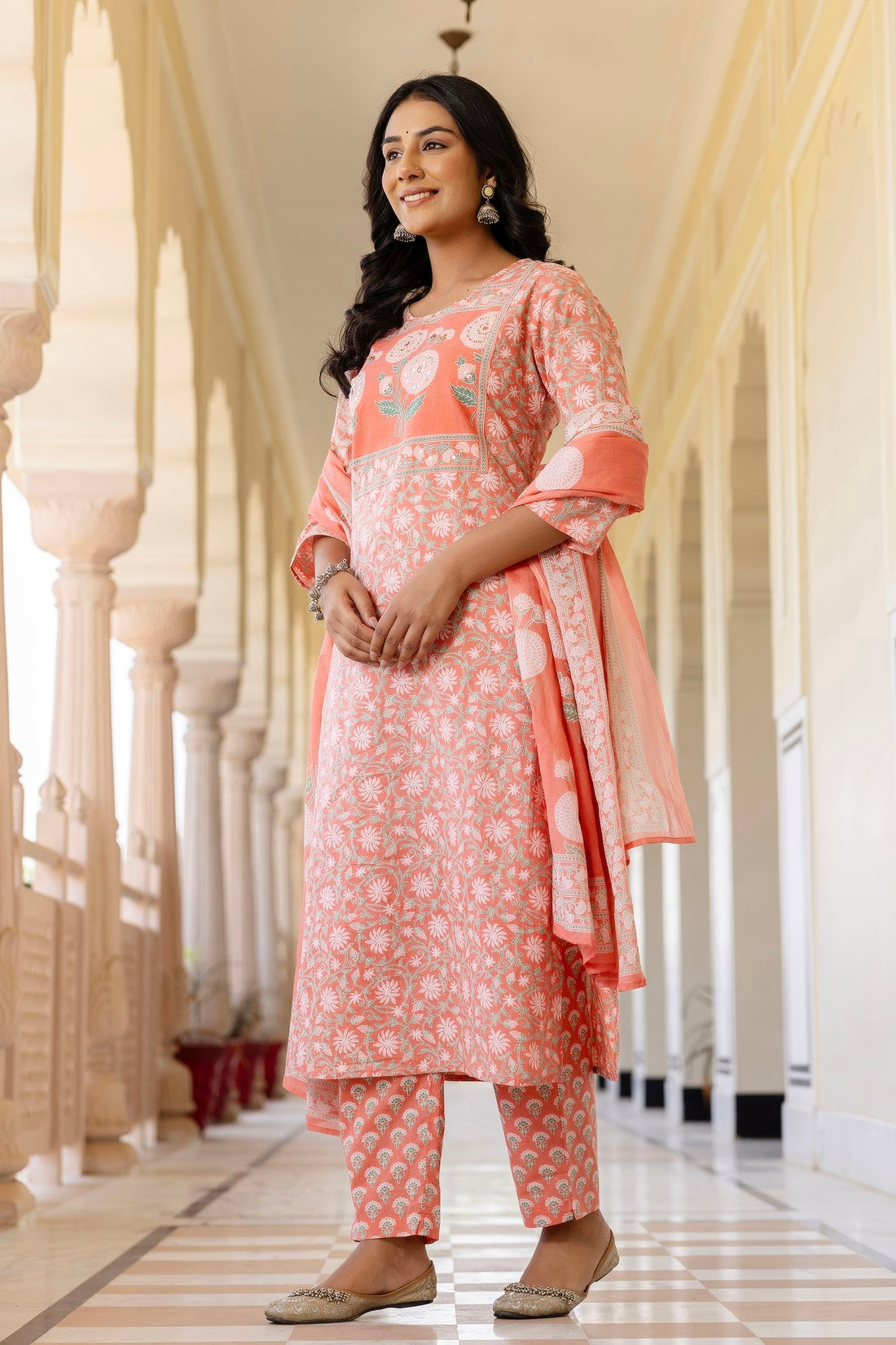 Peach Yoke Highlighted Floral Cotton Kurta Set with Trousers and Dupatta Peach Yoke Highlighted Floral Cotton Kurta Set with Trousers and Dupatta
