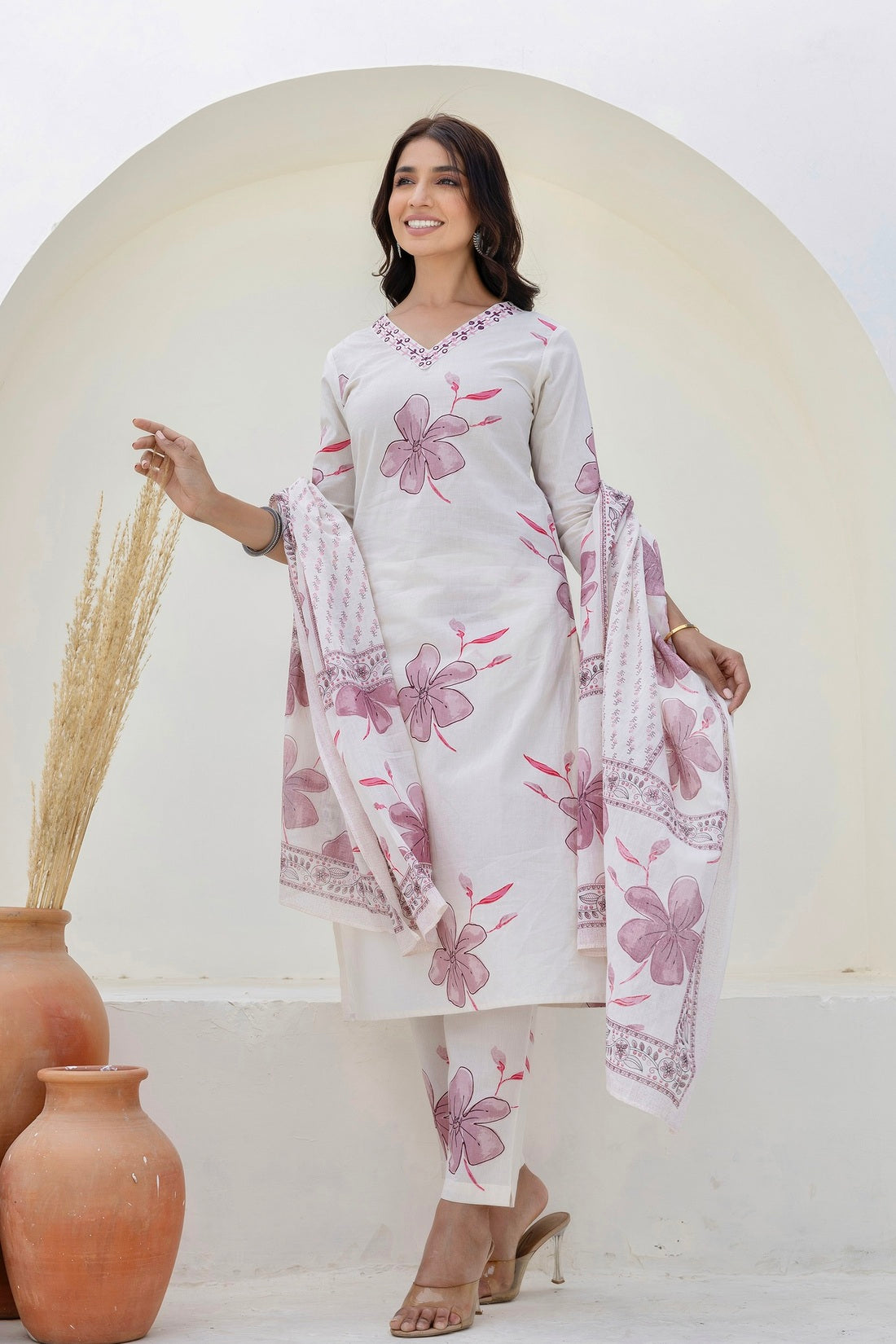 White and Pink Floral Cotton Kurta Set with Trousers and Dupatta White and Pink Floral Cotton Kurta Set with Trousers and Dupatta