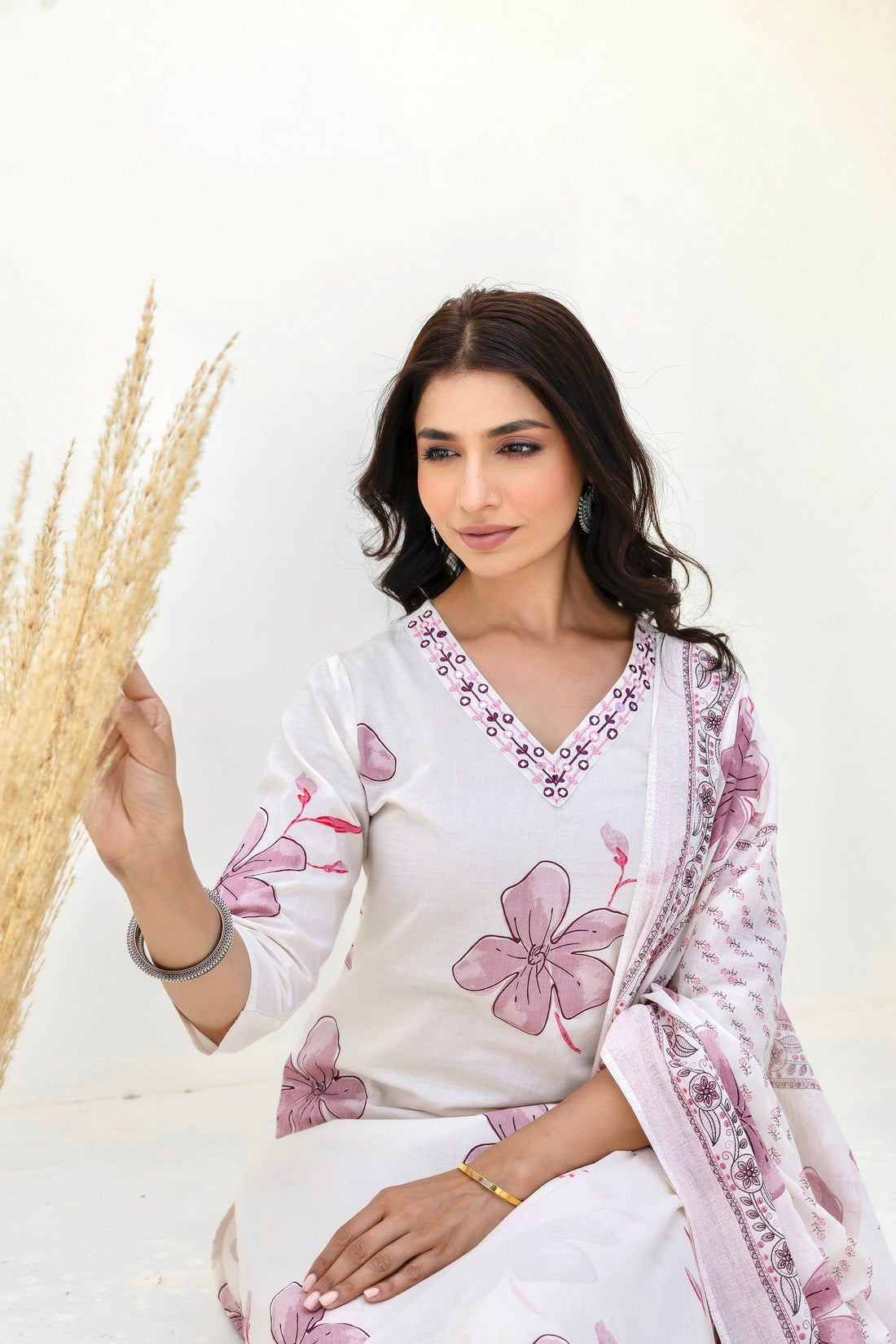 White and Pink Floral Cotton Kurta Set with Trousers and Dupatta White and Pink Floral Cotton Kurta Set with Trousers and Dupatta