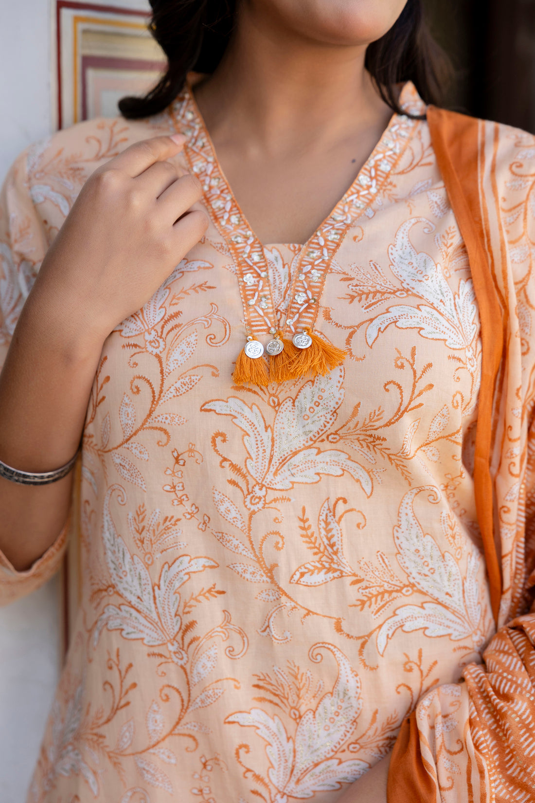 Peach Neck Highlight Printed Cotton Kurta Set with Trousers and Dupatta Peach Neck Highlight Printed Cotton Kurta Set with Trousers and Dupatta