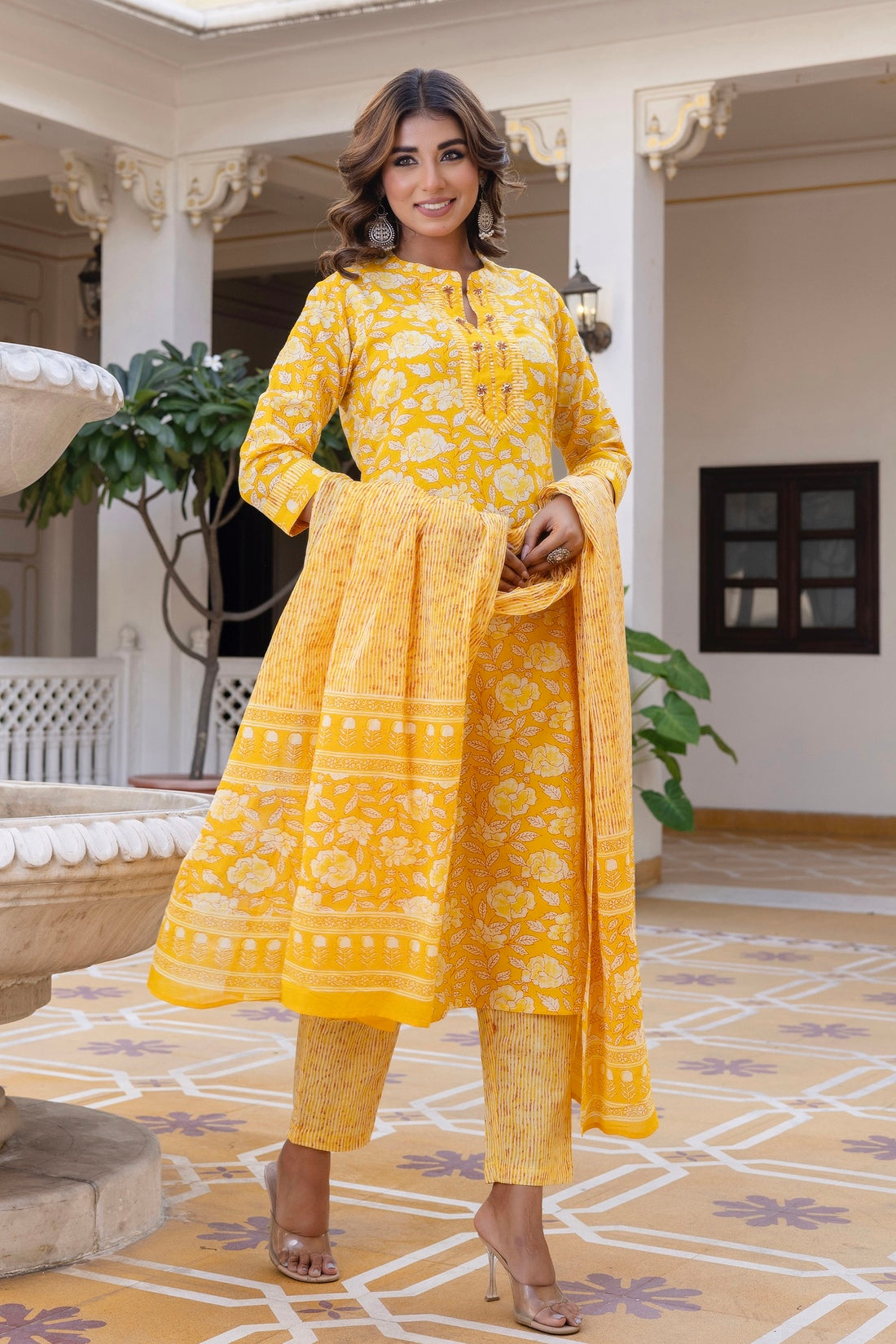 Yellow Plackett Design Cotton Kurta Set with Trousers and Dupatta Yellow Plackett Design Cotton Kurta Set with Trousers and Dupatta