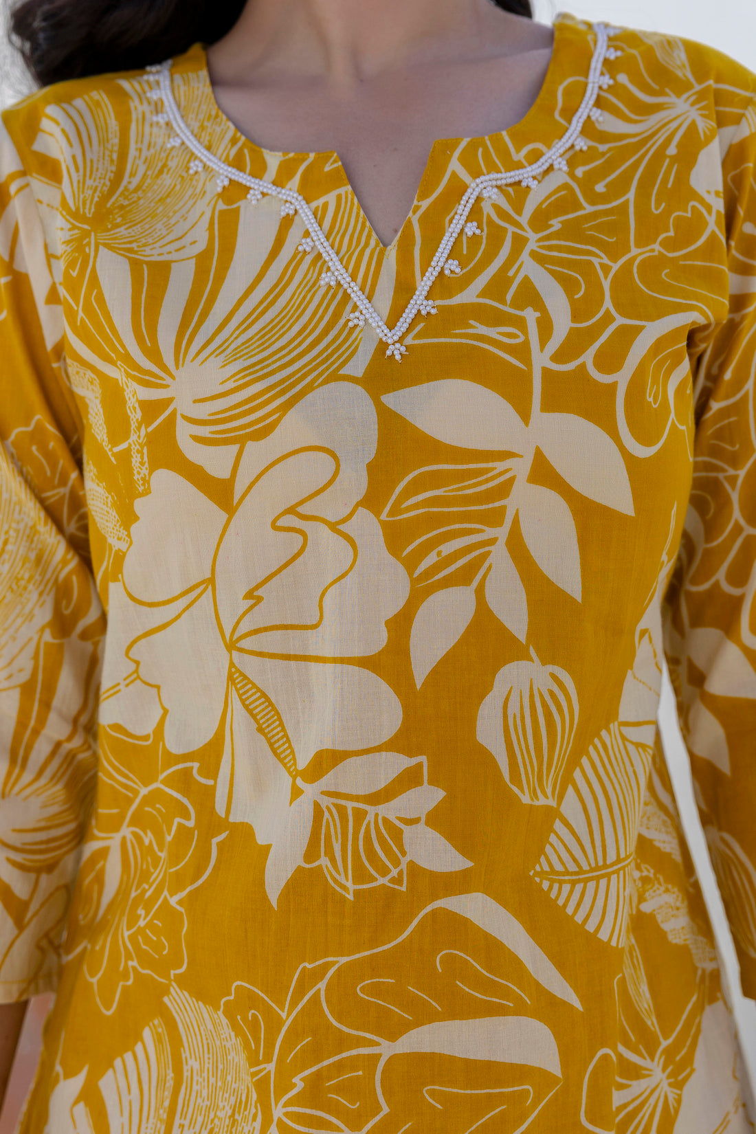 Mustard Yellow Pearl Highlight Cotton Kurta Set with Trousers and Dupatta Mustard Yellow Pearl Highlight Cotton Kurta Set with Trousers and Dupatta