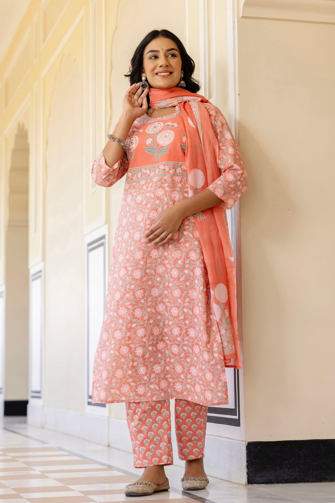 Peach Yoke Highlighted Floral Cotton Kurta Set with Trousers and Dupatta Peach Yoke Highlighted Floral Cotton Kurta Set with Trousers and Dupatta