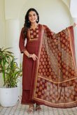 Rust Solid Kurta Set with Yoke Design with Palazzos and Printed Dupatta